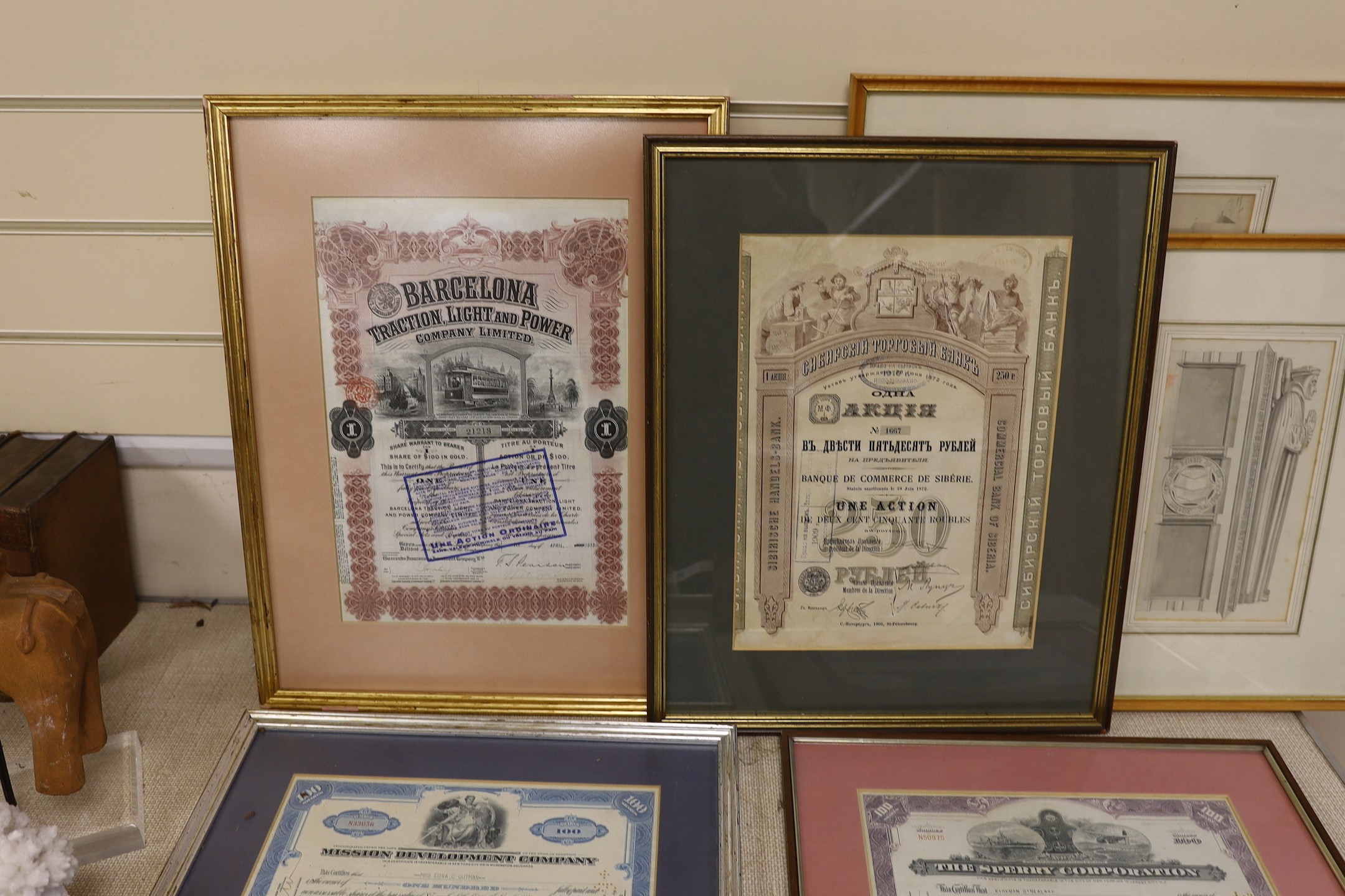 Four framed share certificates and two religious engravings